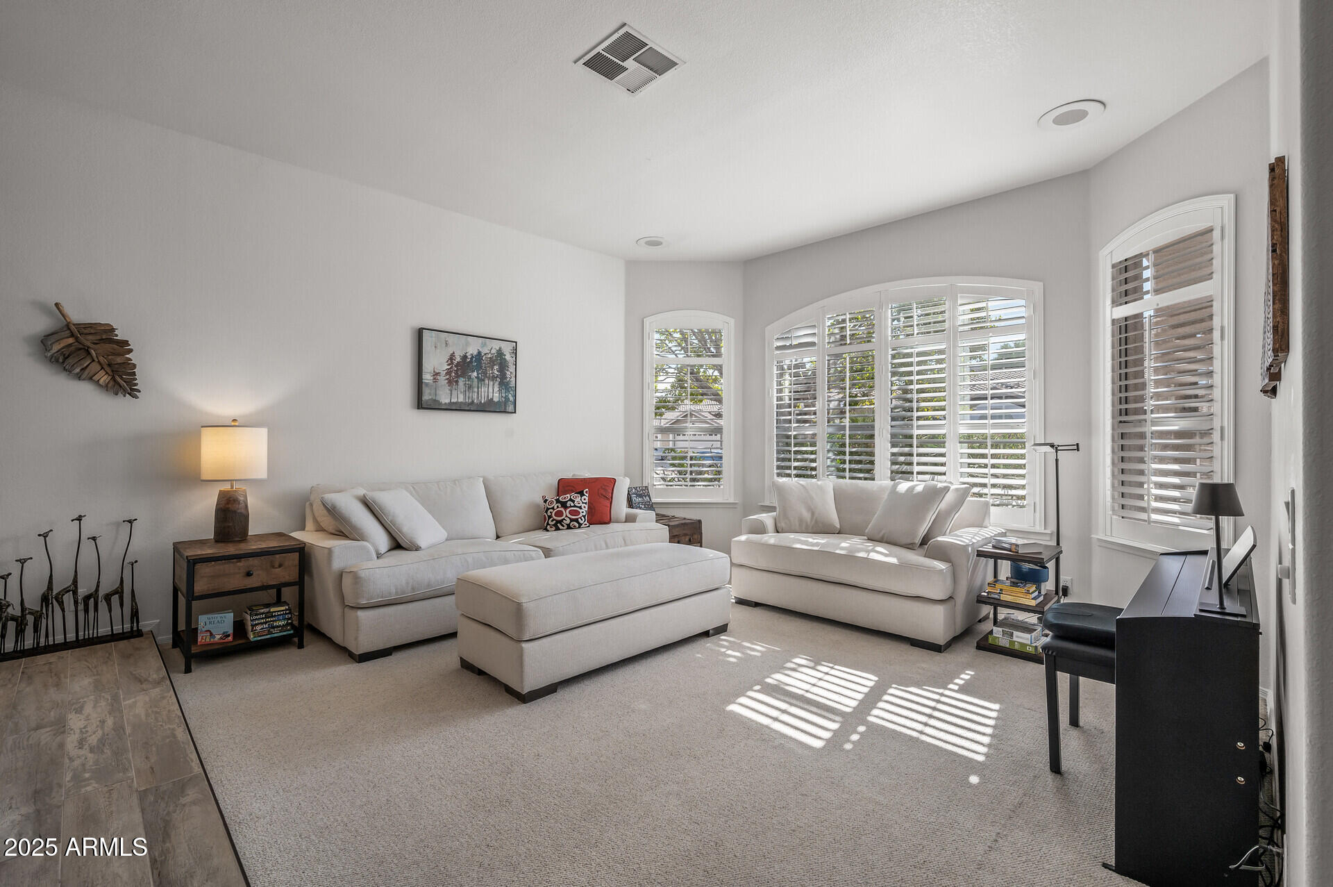 1626 East Kathleen Road Phoenix, AZ 85022 - Photo 9 of 47 a living room with furniture and large windows