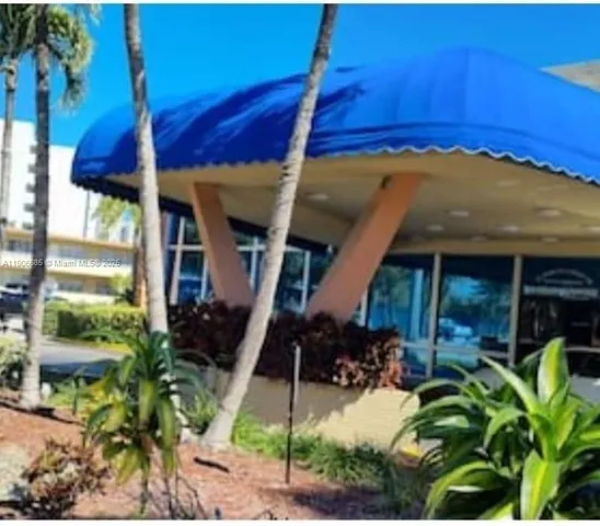 a view of a backyard with plants
