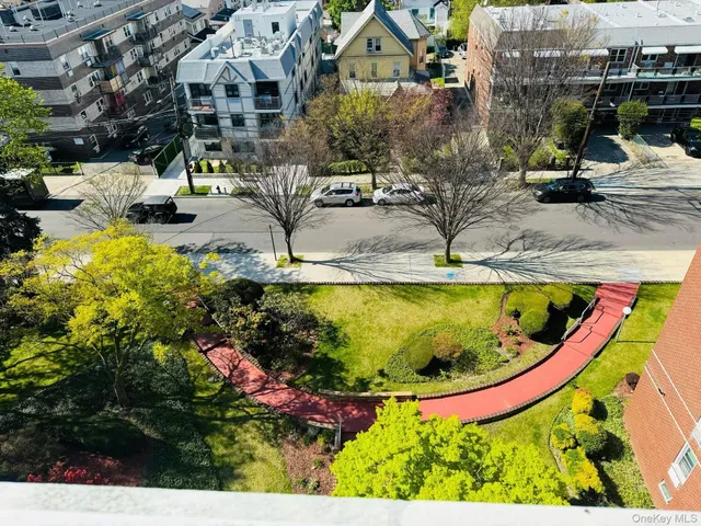 a view of a street with houses on both side