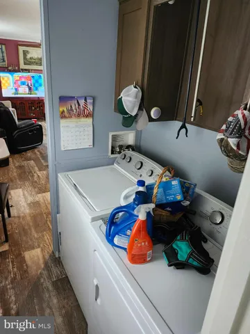 a room with furniture and a flat screen tv