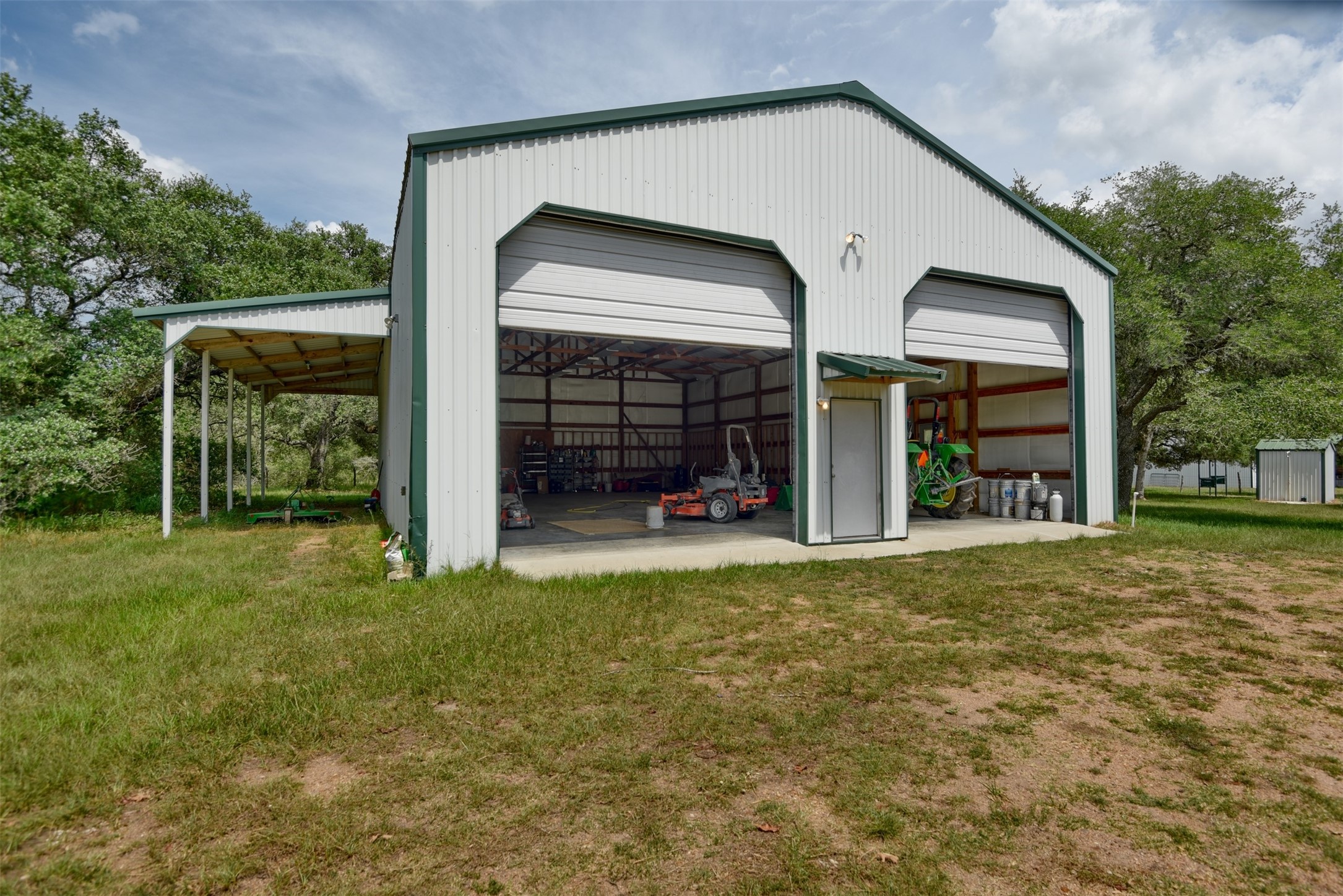 2003 Oak Ridge Road Weimar, TX 78962 - Photo 21 of 35 front view of a house with a yard