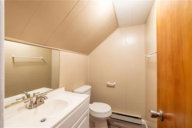 a view of a bathroom with a sink and a window