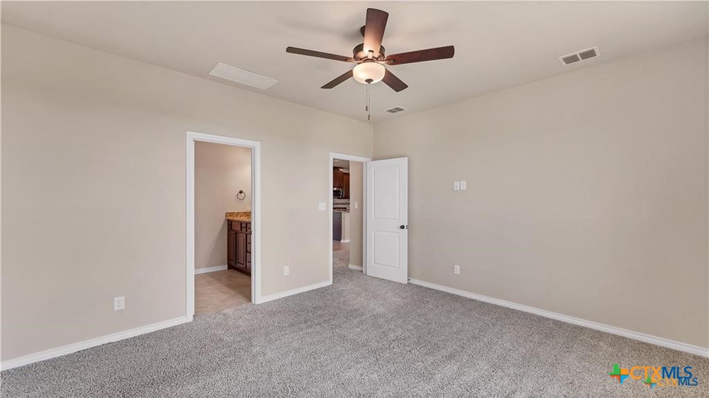559 Bylerpool Road Kingsbury, TX 78638 - Photo 29 of 36 a view of a livingroom with a ceiling fan