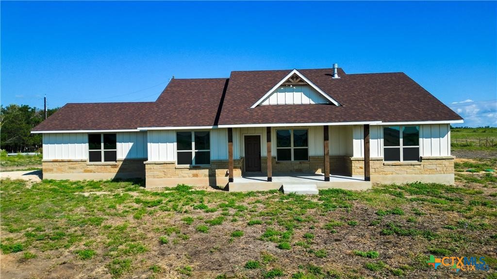 559 Bylerpool Road Kingsbury, TX 78638 - Photo 3 of 36 a front view of a house with garden and porch