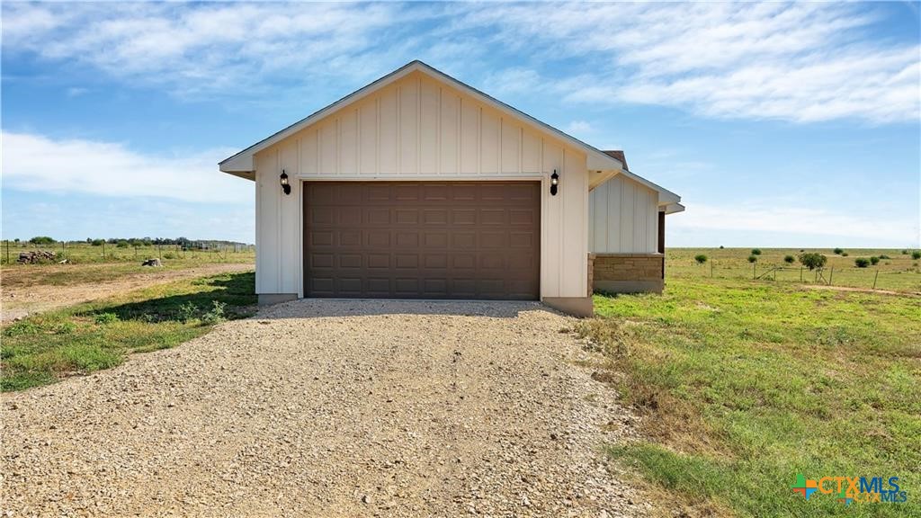 559 Bylerpool Road Kingsbury, TX 78638 - Photo 36 of 36 a front view of a house with a yard and lake