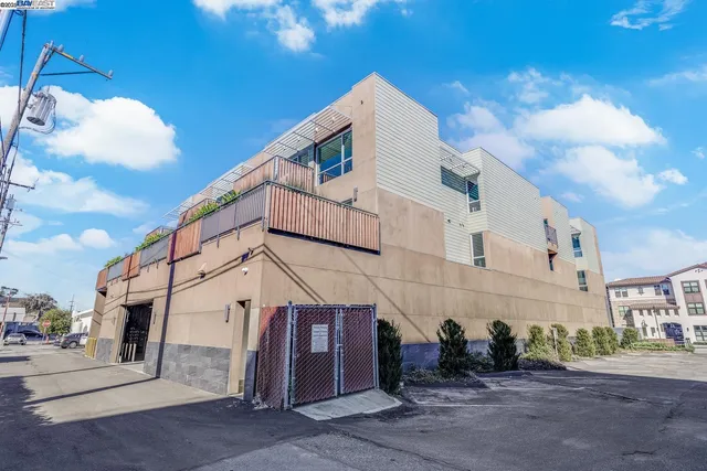 a view of a street with big house