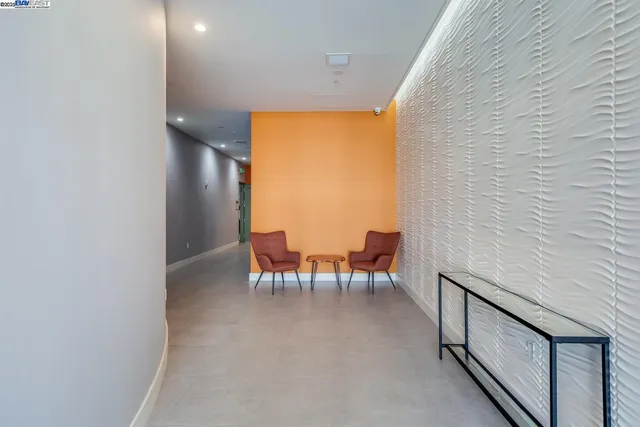 a view of a livingroom with furniture and window