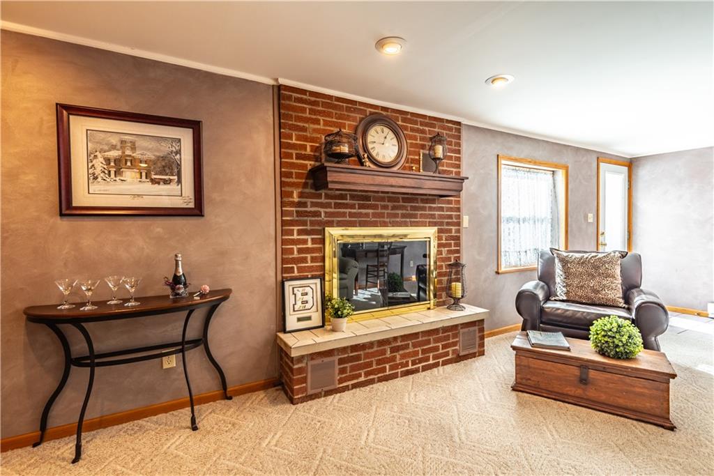 157 Seneca Drive Butler, PA 16001 - Photo 18 of 31 a living room with furniture and a fireplace