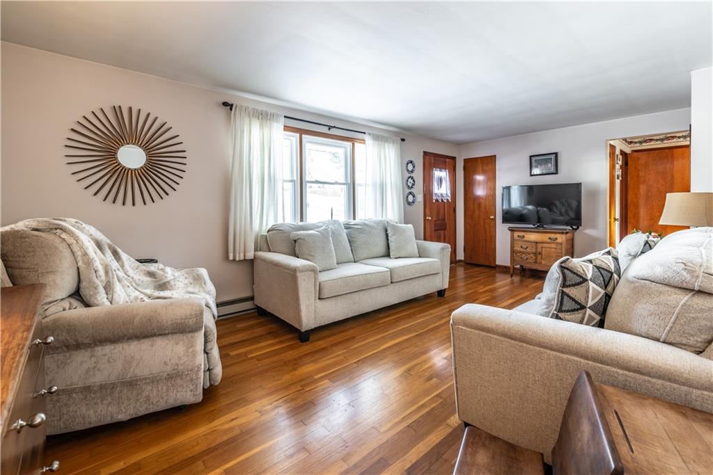 157 Seneca Drive Butler, PA 16001 - Photo 7 of 31 a living room with furniture and a large window