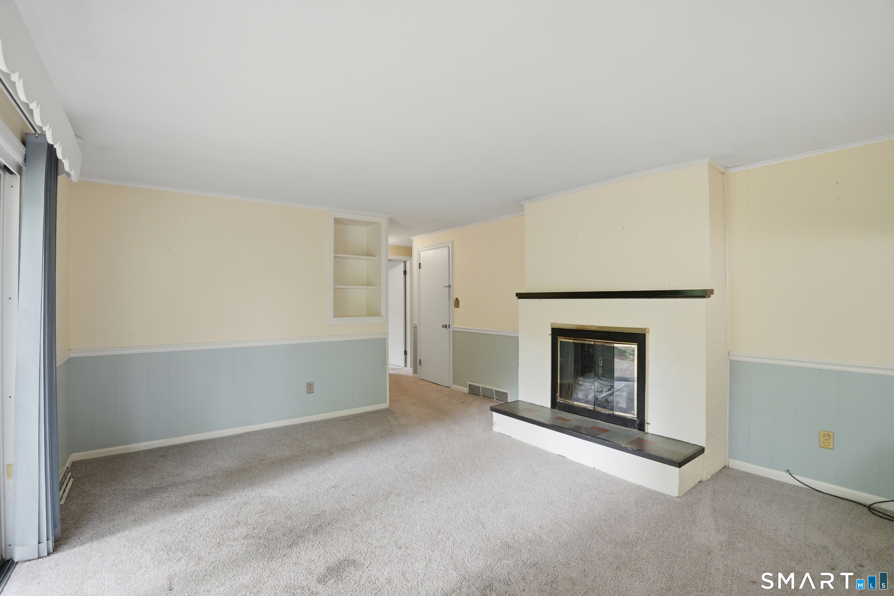 731 Still Hill Road Hamden, CT 06518 - Photo 30 of 40 an empty room with a fireplace