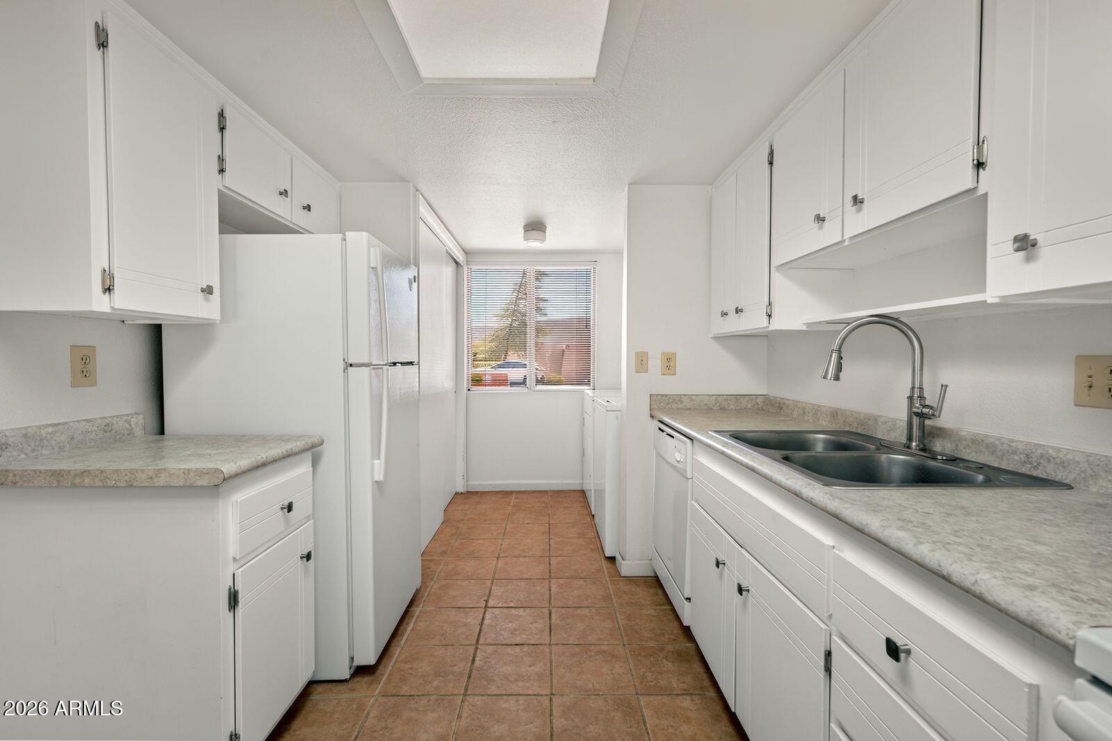 130 Castle Rock Road, Unit 46 Sedona, AZ 86351 - Photo 10 of 19 KITCHEN SINK & FRIDGE