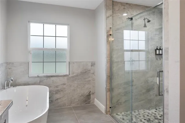 a view of a hallway with washer and dryer