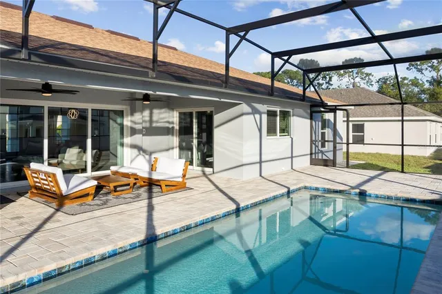 a view of a living room with furniture