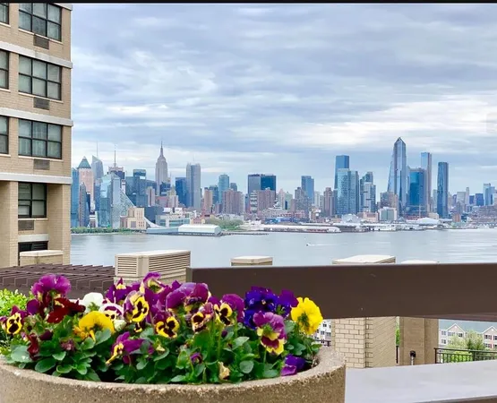 a kitchen with granite countertop a stove top oven sink and cabinets