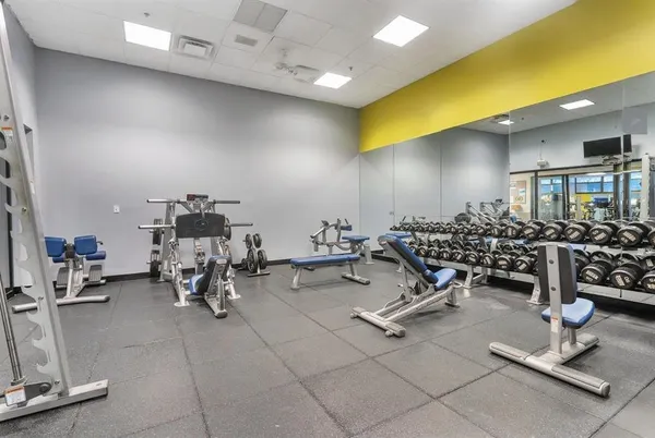 a view of a room with gym equipment