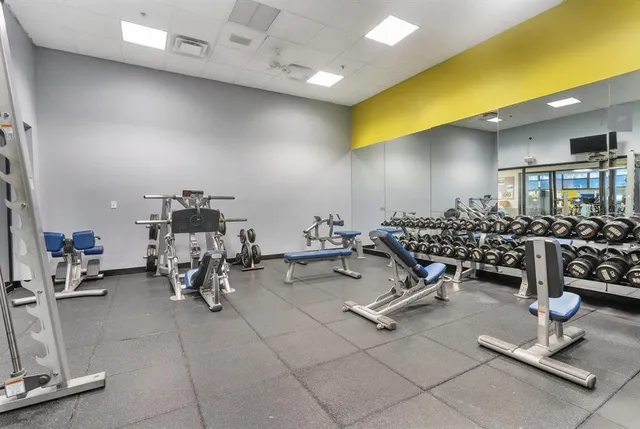 a view of a room with gym equipment