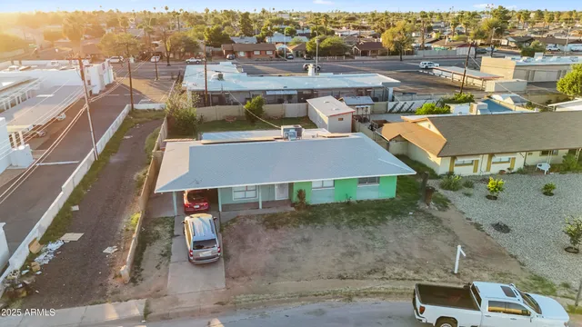 an aerial view of a house with a garden