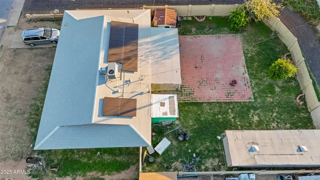a view of a house with backyard and outdoor space