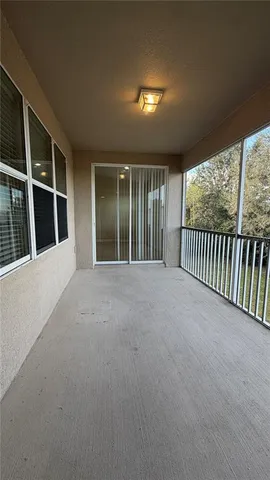 a aerial view of a house with a yard