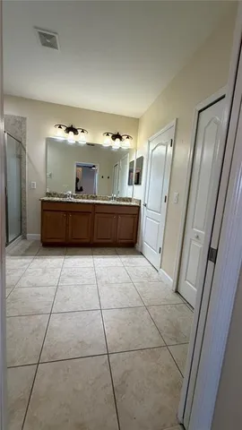 a room with a refrigerator and washer