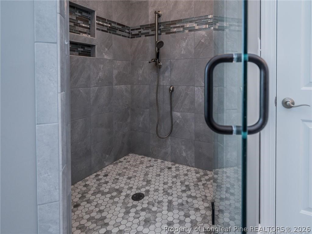 1102 West Carthage Road Lumberton, NC 28360 - Photo 23 of 41 a bathroom with a shower
