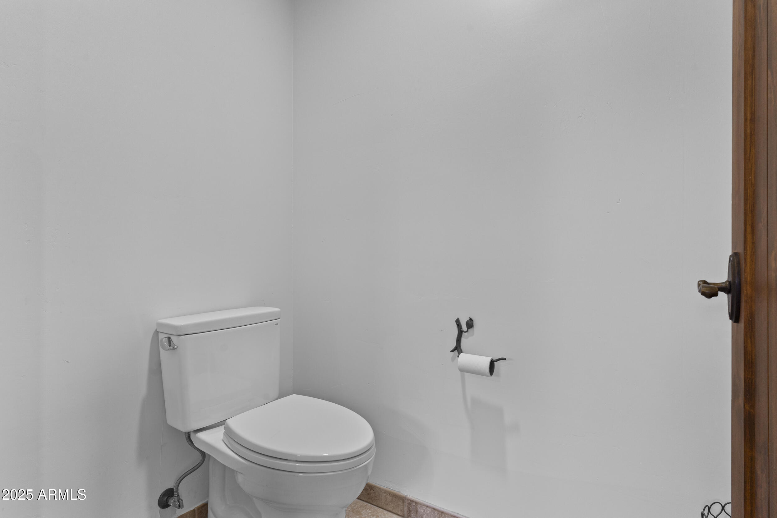 36601 North Mule Train Road, Unit D18 Carefree, AZ 85377 - Photo 23 of 53 a white toilet sitting next to a shower