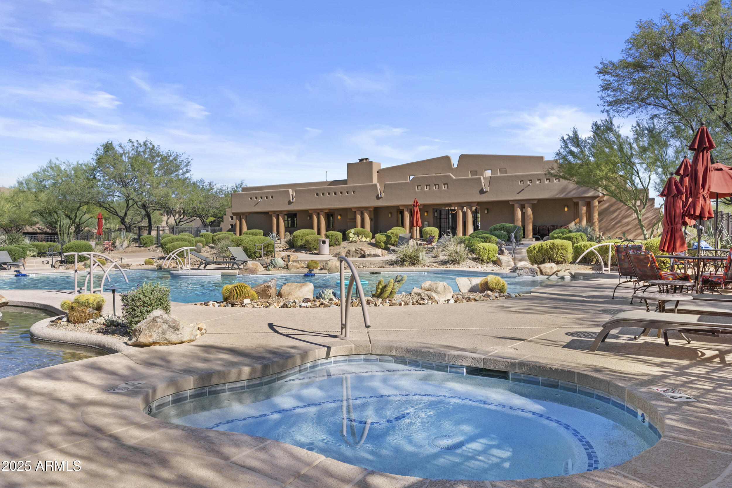 36601 North Mule Train Road, Unit D18 Carefree, AZ 85377 - Photo 46 of 53 a row of furniture and city view