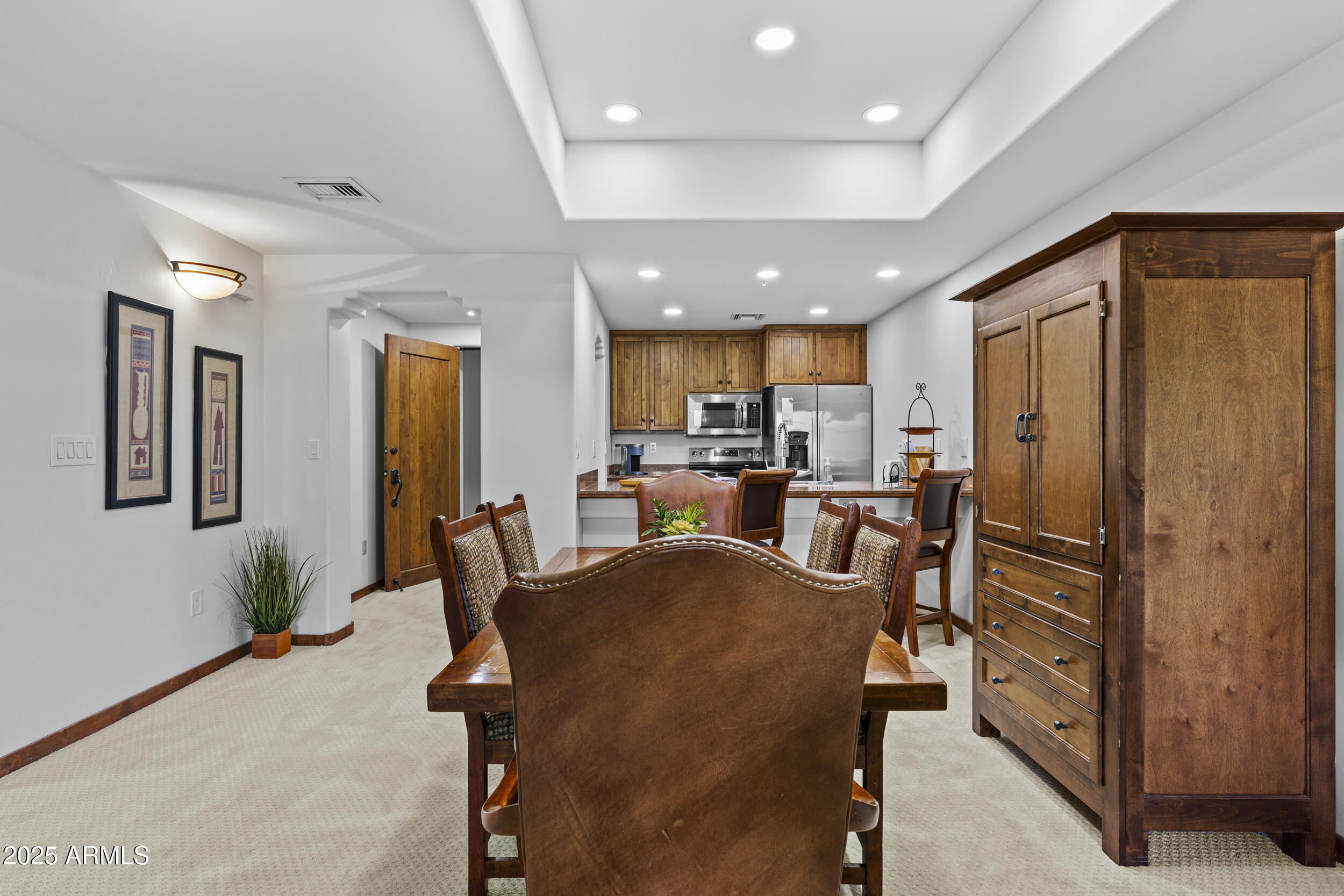 36601 North Mule Train Road, Unit D18 Carefree, AZ 85377 - Photo 8 of 53 a view of a dining room with furniture and a window