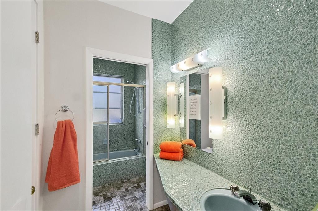 2605 Desoto Road Sarasota, FL 34234 - Photo 33 of 57 a bathroom with a sink and a mirror