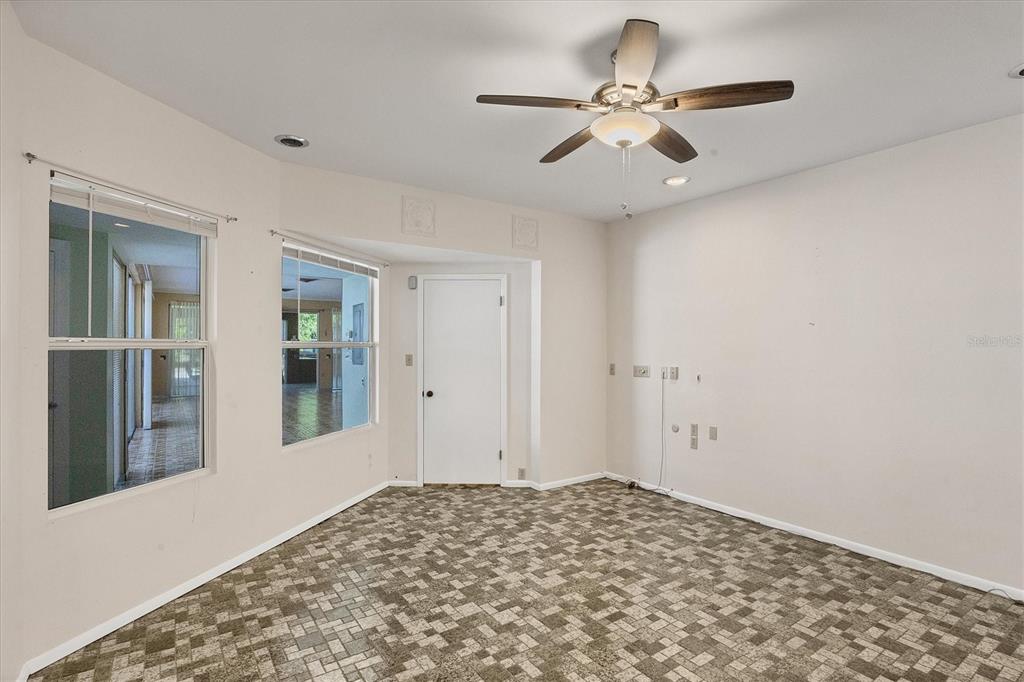 2605 Desoto Road Sarasota, FL 34234 - Photo 35 of 57 a view of a livingroom with a ceiling fan and window