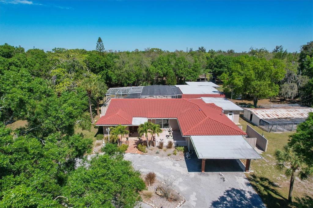 2605 Desoto Road Sarasota, FL 34234 - Photo 5 of 57 an aerial view of a house with swimming pool and a yard