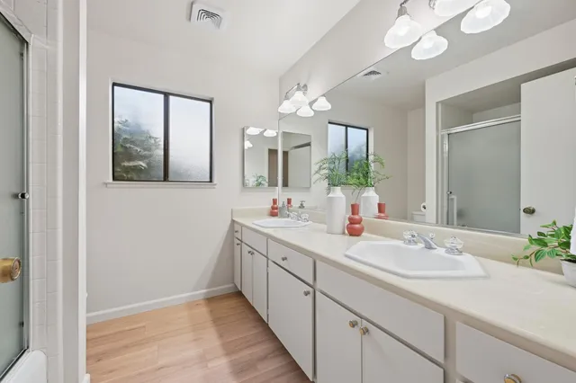 a bathroom with a sink and a mirror