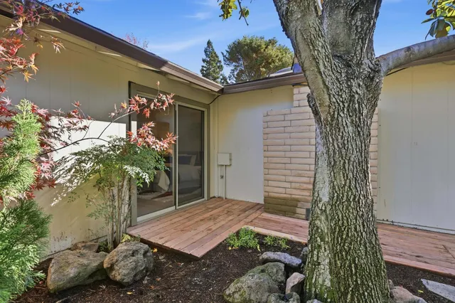 a view of empty room with white walls