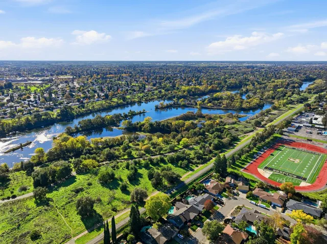 an aerial view of a city with lots of residential buildings