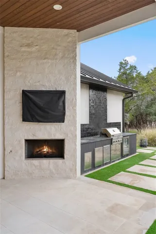 a view of a patio with swimming pool table and chairs