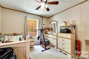 179 Fresh Water Rdg Road Whittier, NC 28789 - Photo 25 of 48 a view of a bedroom with furniture and windows
