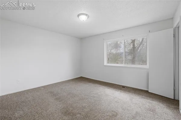 an empty room with a window
