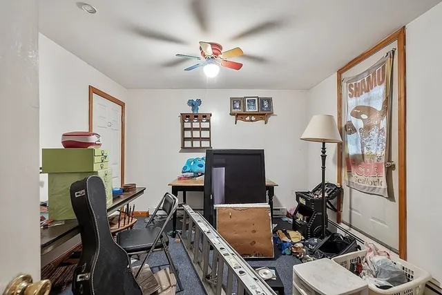 a room with furniture and wooden floor