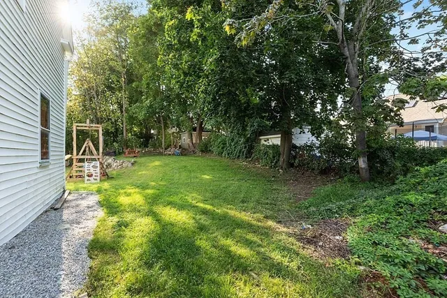 a view of a backyard with a garden