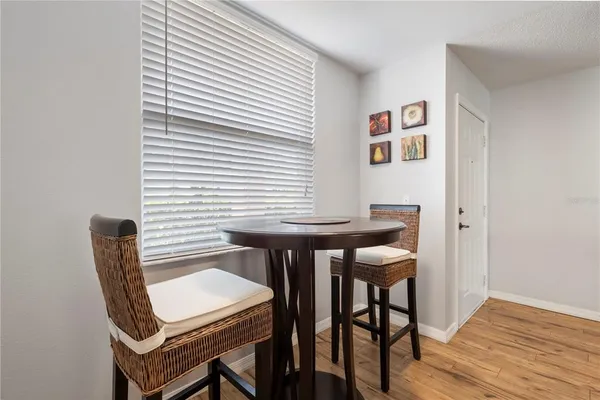 a view of a workspace with furniture