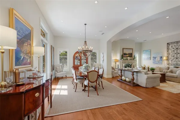 a living room with furniture fireplace and window