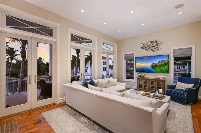 a spacious bedroom with a bed and a large mirror