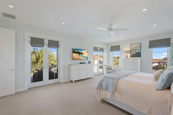 a bedroom with furniture and a window