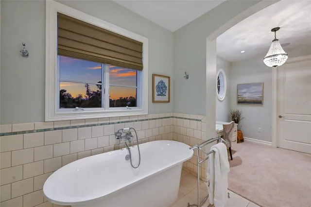 a view of a chairs and table in the yard