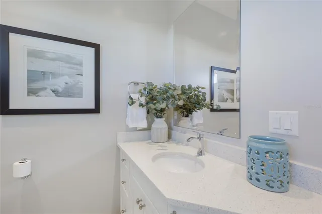 an aerial view of a house with a lake view