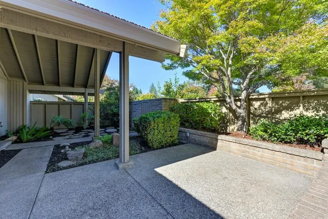 a house view with a seating space and garden view