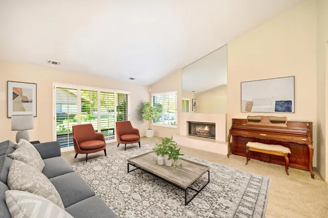 a kitchen that has a sink and a stove in it
