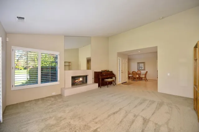 a kitchen with a stove a sink and a refrigerator