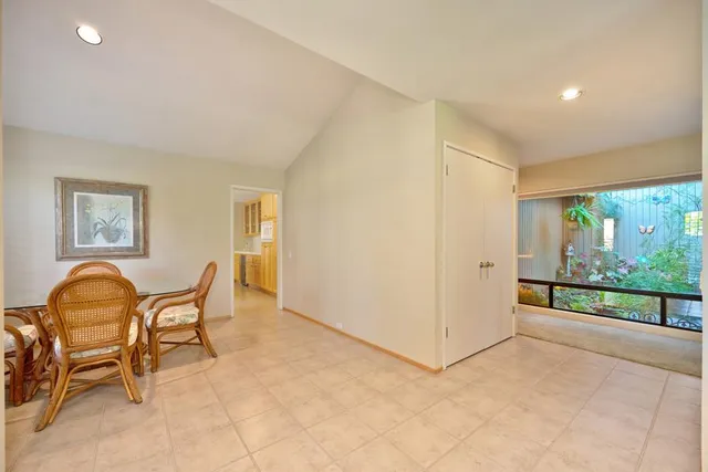 a kitchen that has a sink and a stove in it