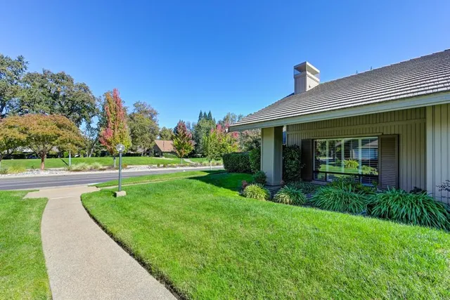 a view of a back yard of the house